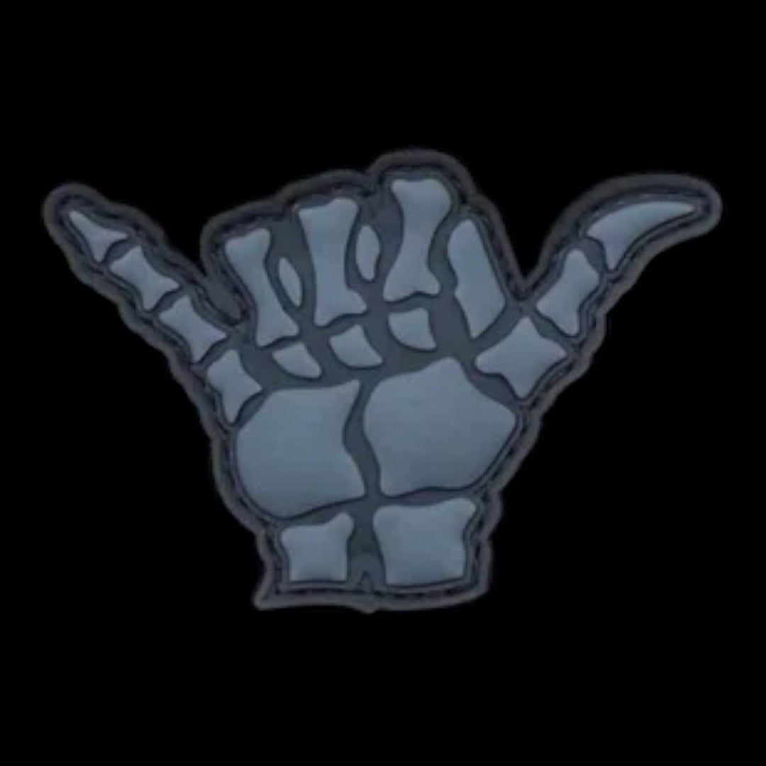Skull hand grey